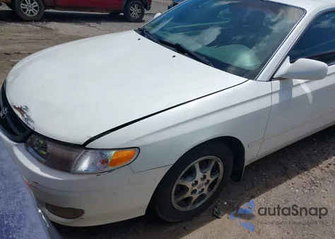 1999 Toyota Camry Solara Sle из США, поврежденный, VIN 2T1CF22P9XC197560